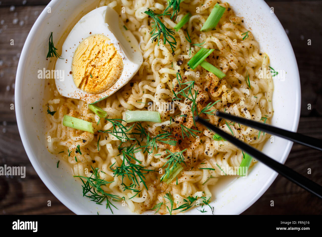 Asian noodles with fresh green onion and boiled egg Stock Photo Alamy