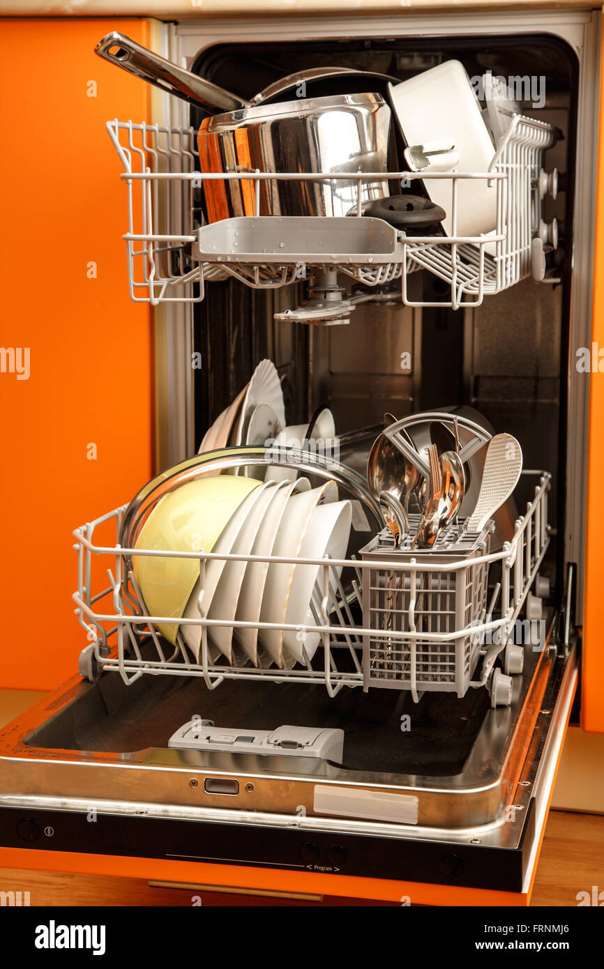 Clean dishes in dishwashing machine in closeup Stock Photo Alamy