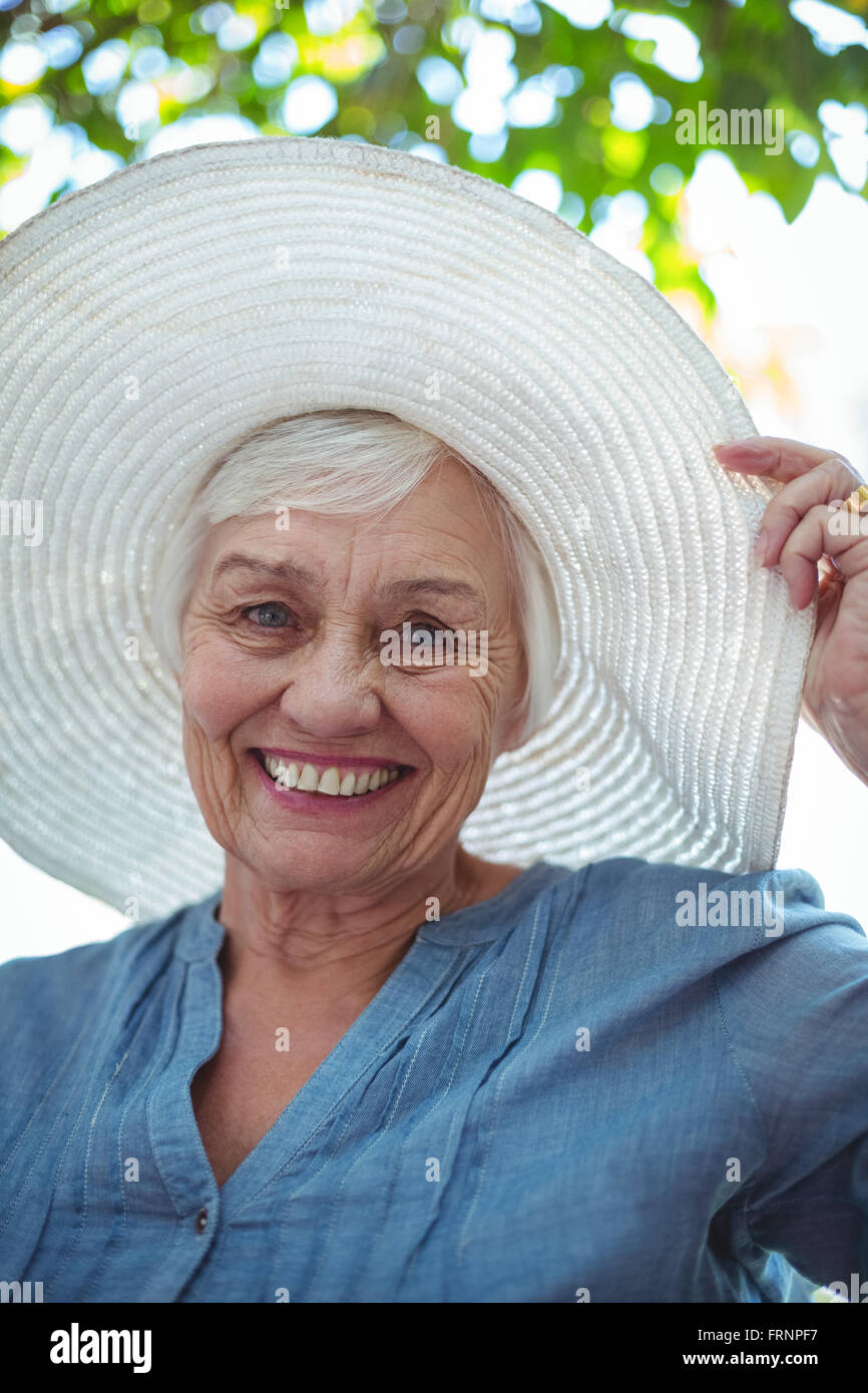 Portrait of senior woman wearing hat Stock Photo