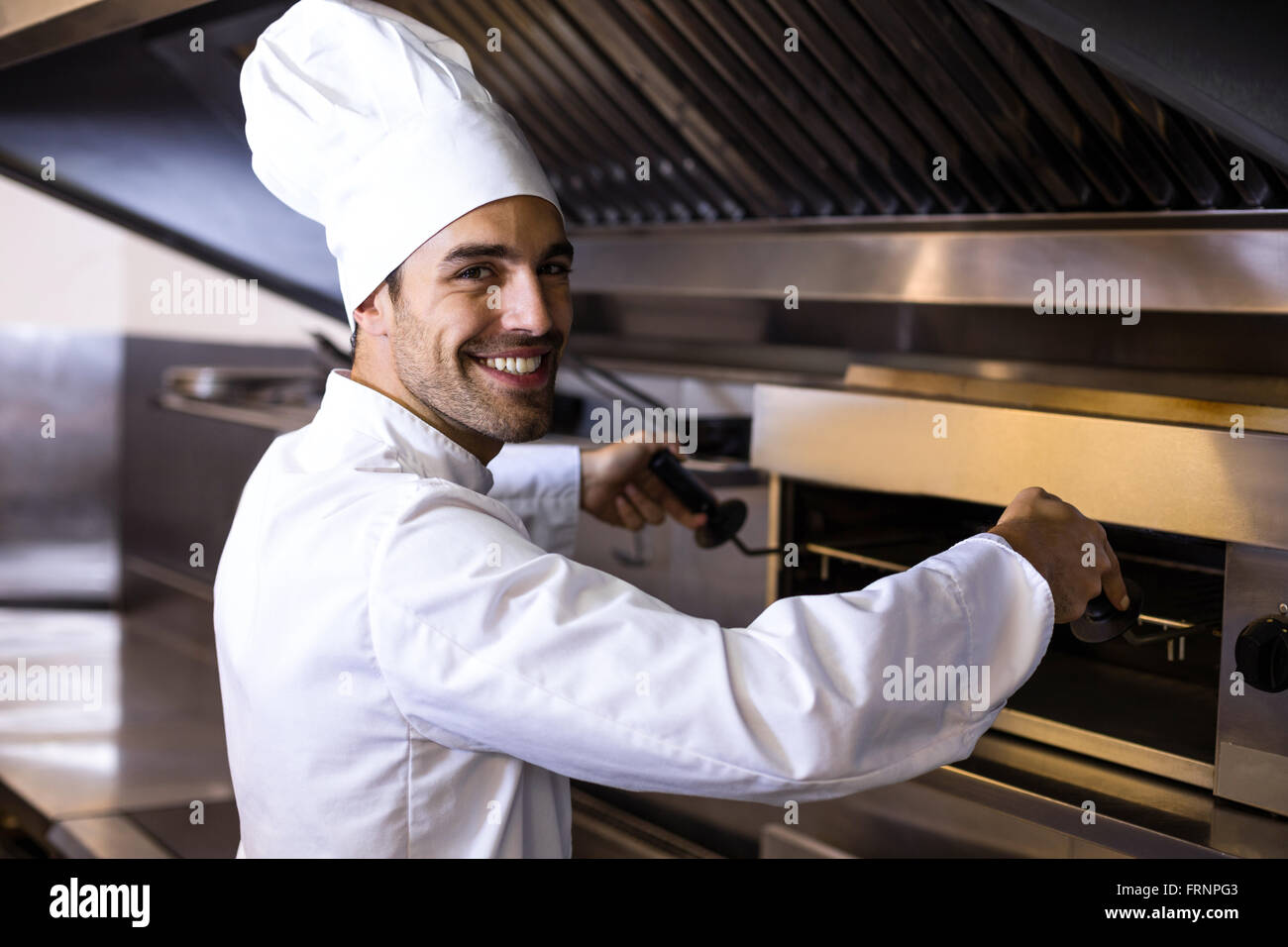 Handsome chef preparing grill Stock Photo Alamy