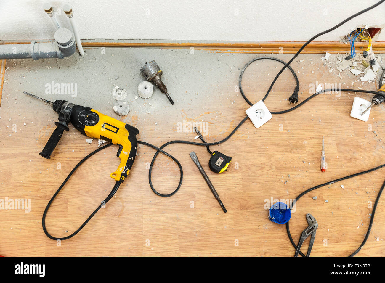 Place of electric socket repair process with drill Stock Photo Alamy