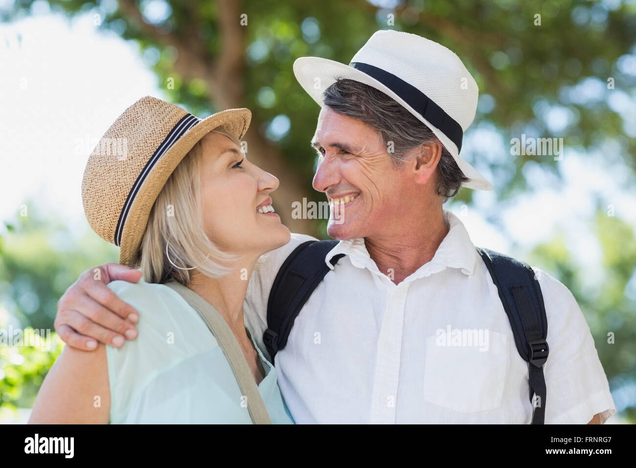 Happy couple looking face to face Stock Photo
