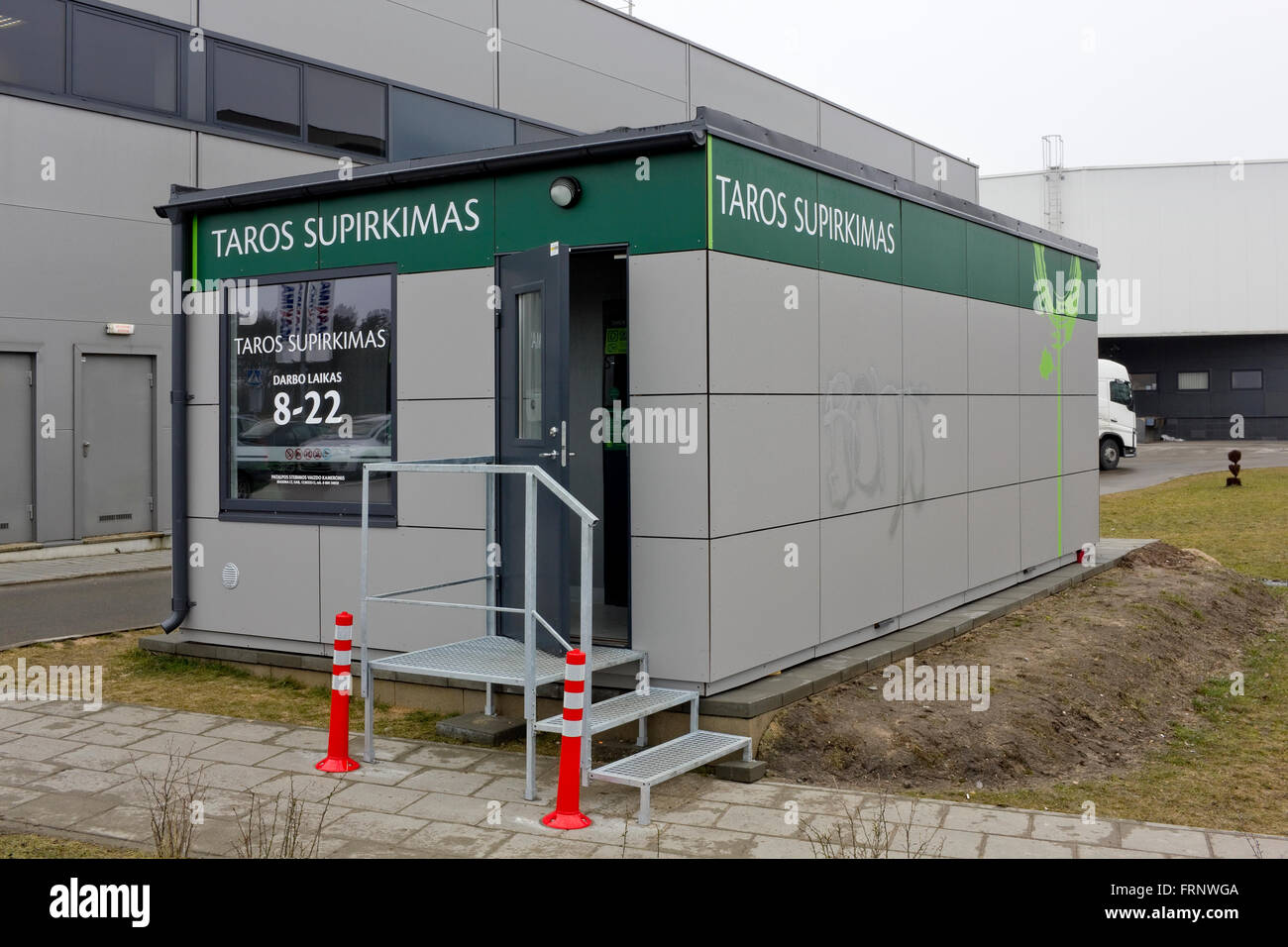 VILNIUS, LITHUANIA - MARCH 12, 2016: Bbooth for reception and purchase of the used glass and plastic bottles and glassware near Stock Photo