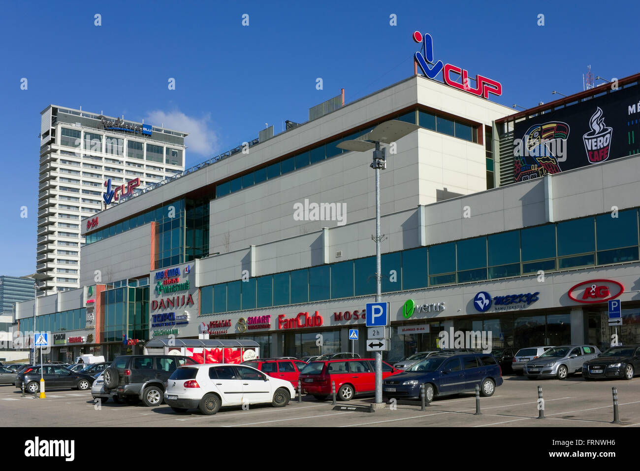 VILNIUS, LITHUANIA - MARCH 13, 2016: The building of the central department store CUP and Radisson hotel against the blue March Stock Photo