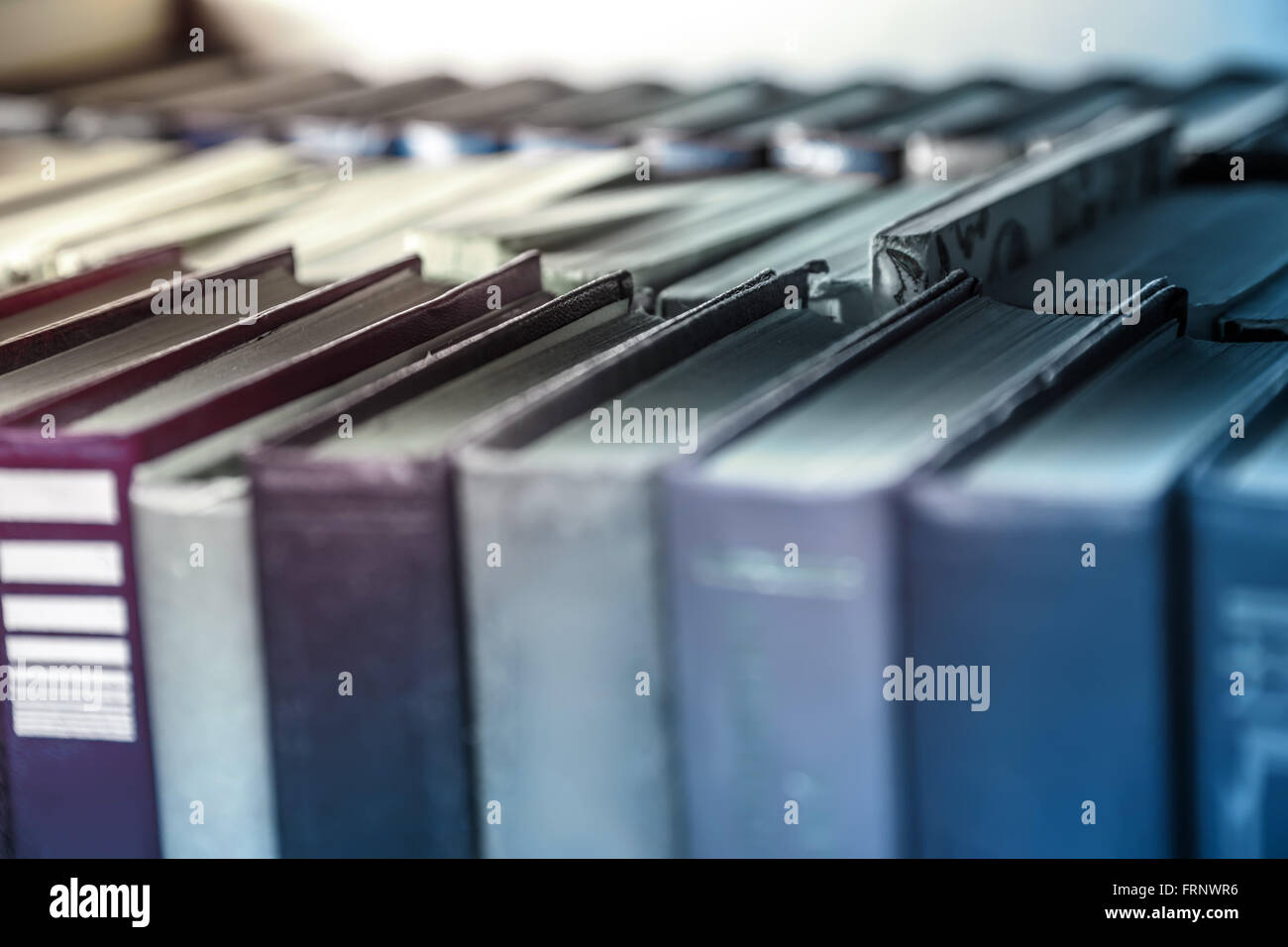 Old books on shelf in the Library Stock Photo - Alamy