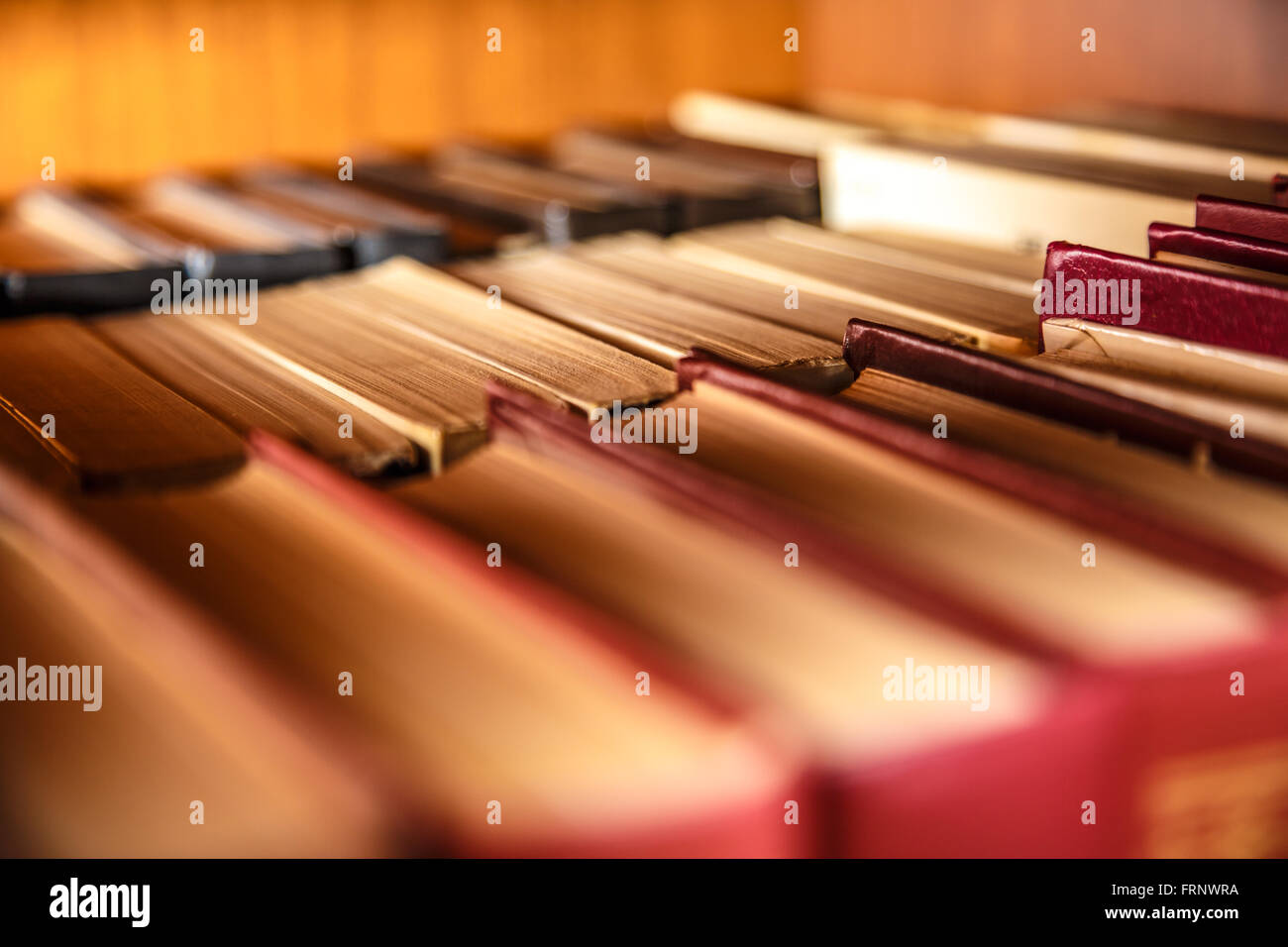 Old books on shelf in the Library Stock Photo - Alamy