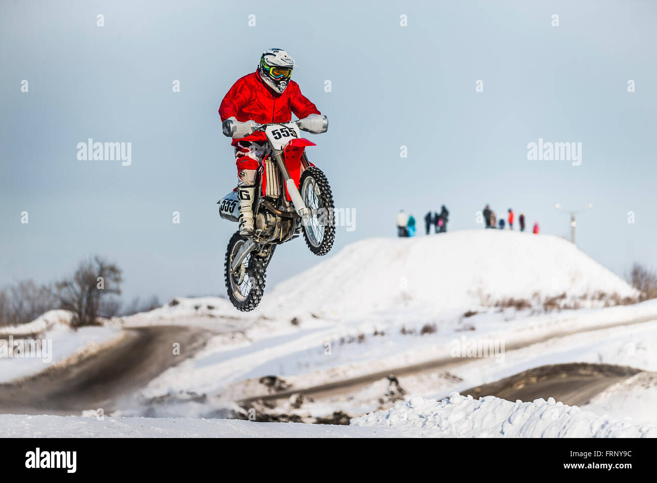 high jump and flight of motorcycle racer during Cup Winter motocross Stock Photo