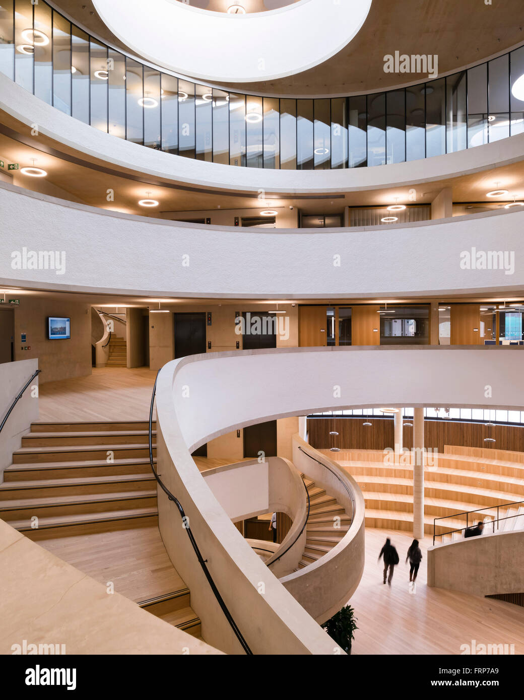 View from 1st floor to top lit foyer and forum with spiral staircase. The  Blavatnik School of Government at the University of Ox Stock Photo - Alamy
