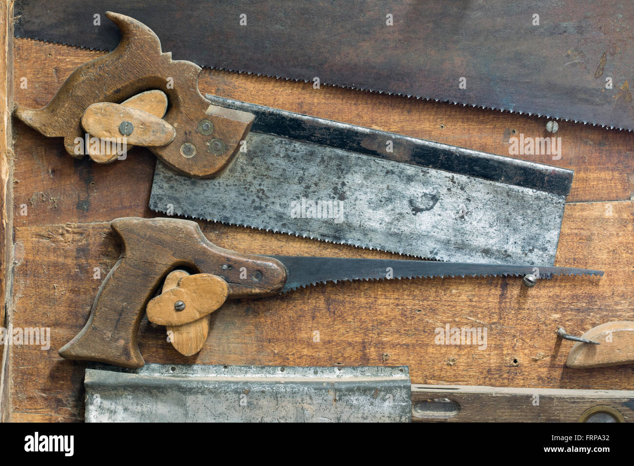 Set of various old and used hand saws Stock Photo - Alamy