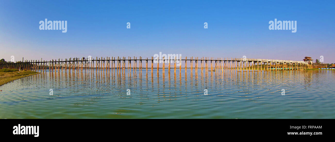 The U Bein Bridge across the Taungthaman Lake in Amarapura, Mandalay ...