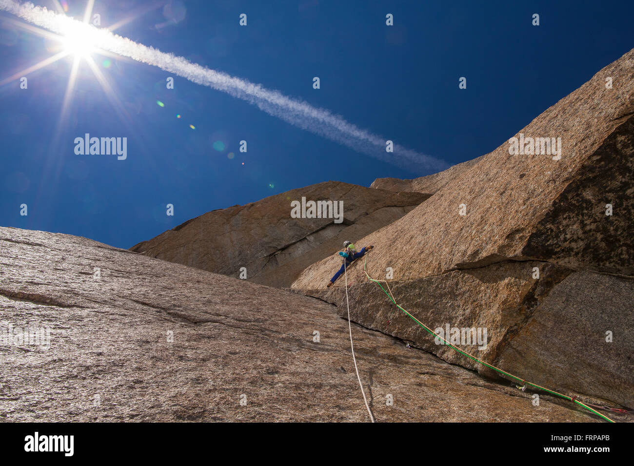 A female French climber, climbing in the Voie Petit, Grand Capucin