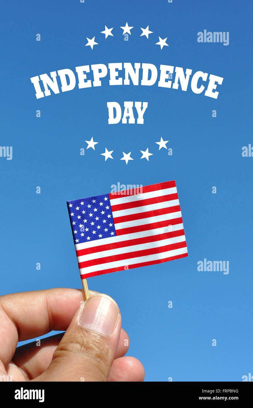 Independence Day usa banner with american flag in blue sky background