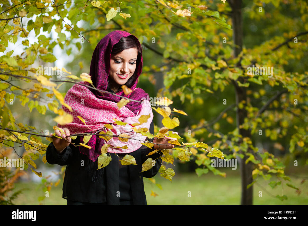 Girl in autumn park Stock Photo - Alamy