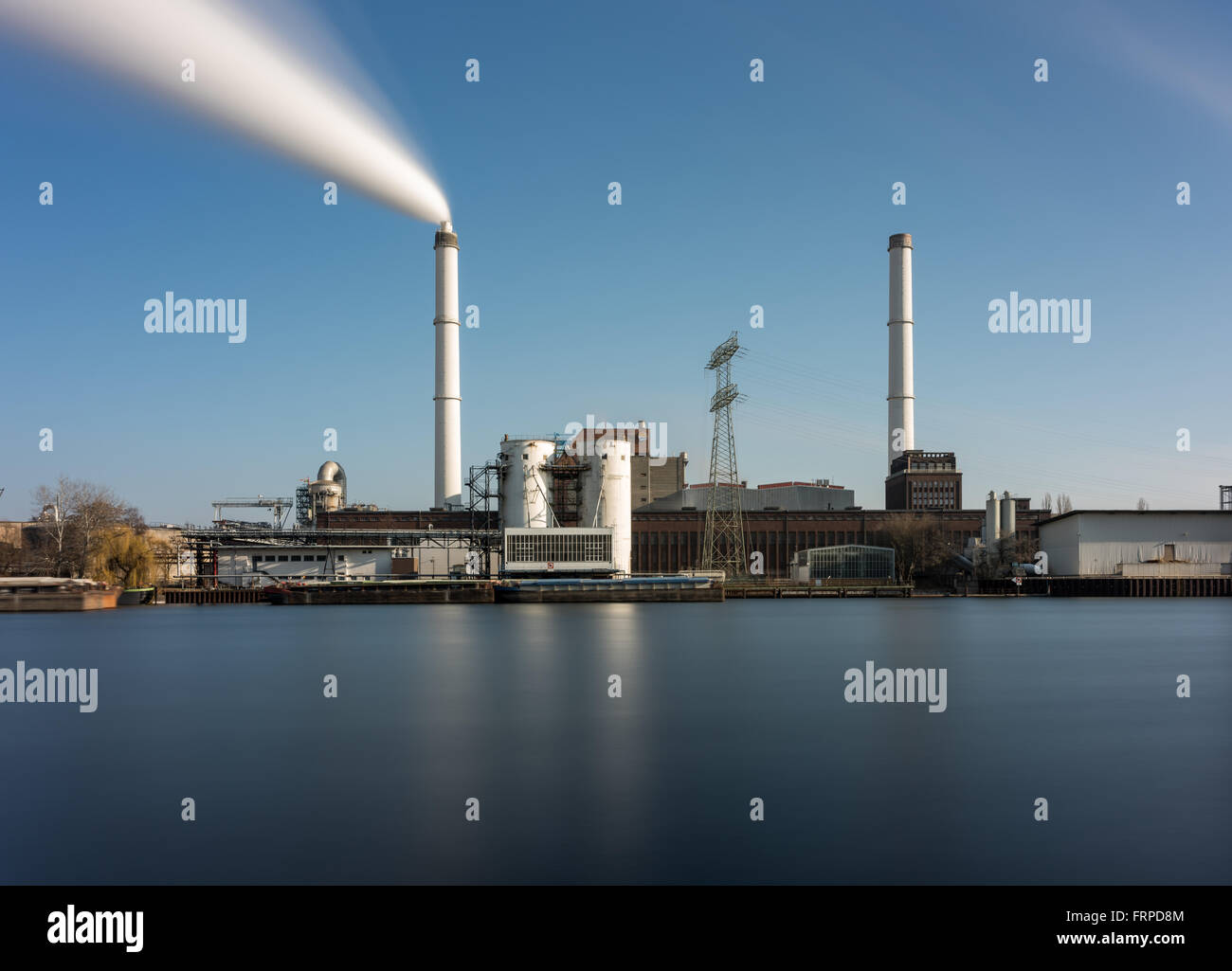View over the Spree on the Klingenberg power plant, Rummelsburg, Berlin, Germany Stock Photo