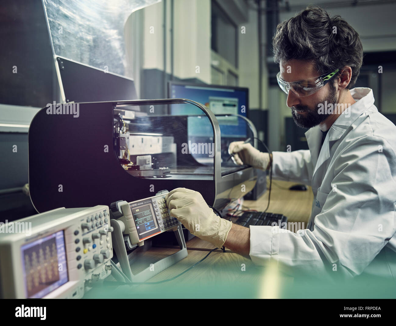 Worker, instrument technician measuring resistance, electrical signals, Austria Stock Photo