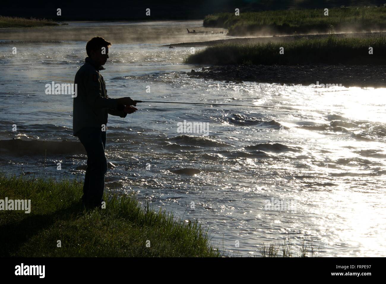 Fly fishing at dawn 7 Stock Photo - Alamy