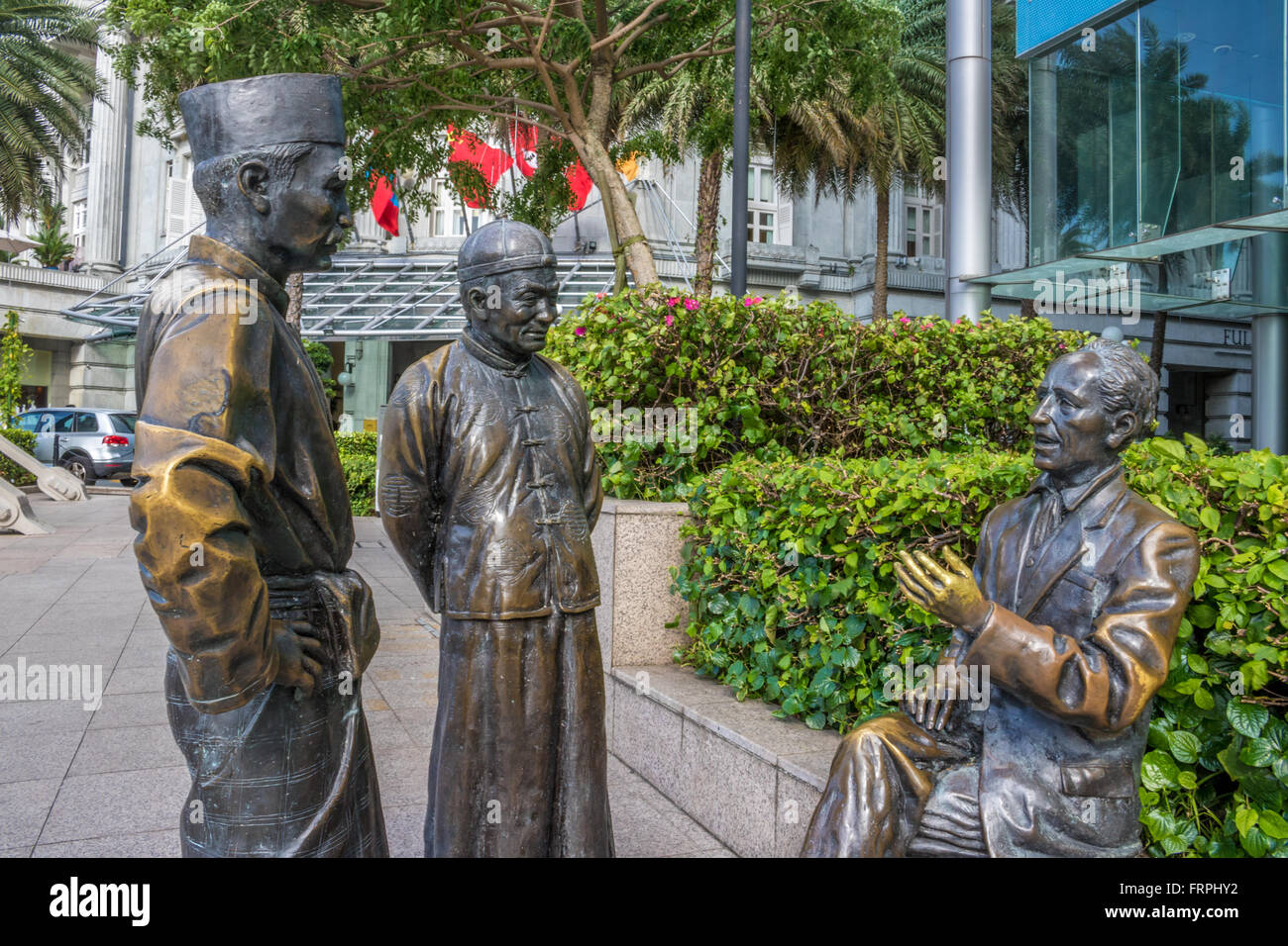 Singapore Sculptures on the bank of the Singapore River depicting life in old Singapore  Adrian Baker Stock Photo