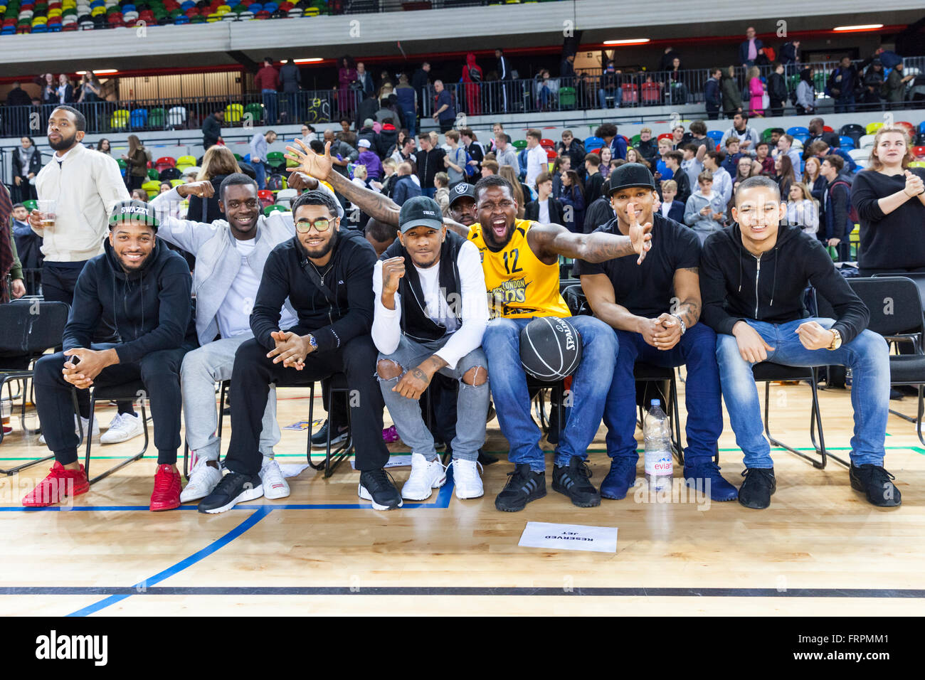 London, UK, 22nd March 2016. QPR footballer Jay Emmanuel-Thomas and friends celebrate the London Lions win following the London Lions vs. Surrey Scorchers BBL game at the Copper Box Arena in the Olympic Park. London Lions win 103-80 Credit:  Imageplotter News and Sports/Alamy Live News Stock Photo
