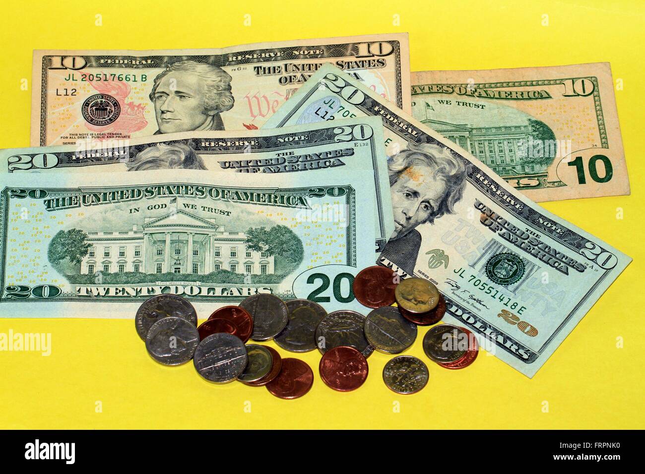 Dollar Coins And Us Dollars In Bills. The Cent Is The Hundredth Part Of A  Dollar. The Dollar Is The Currency In The United States Of America. Usa,  United States Of America,