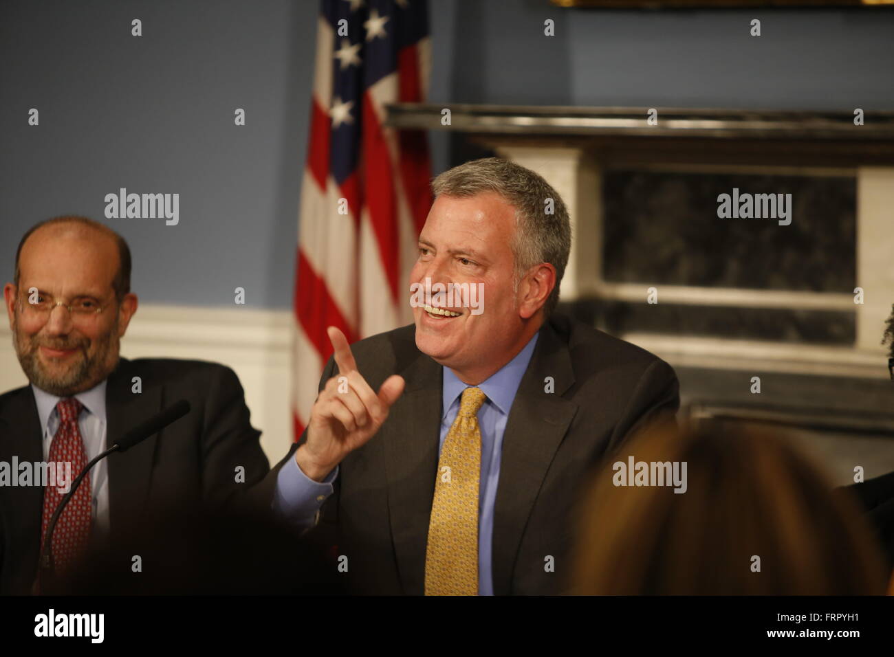 New York City, United States. 23rd Mar, 2016. Mayor de Blasio responds to press inquiry. Mayor de Blasio joined with members of his administration, the city council & healthcare professionals to discuss the need for funding for housing on behalf of victims of domestic violence Credit:  Andy Katz/Pacific Press/Alamy Live News Stock Photo