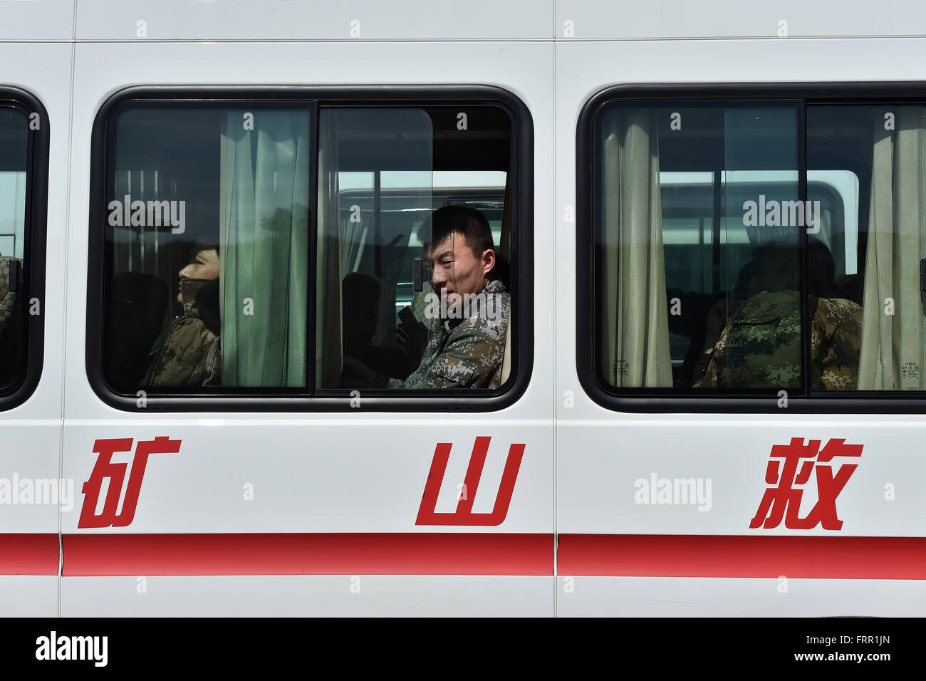 Shanyin, China's Shanxi Province. 24th Mar, 2016. Rescuers stand by at