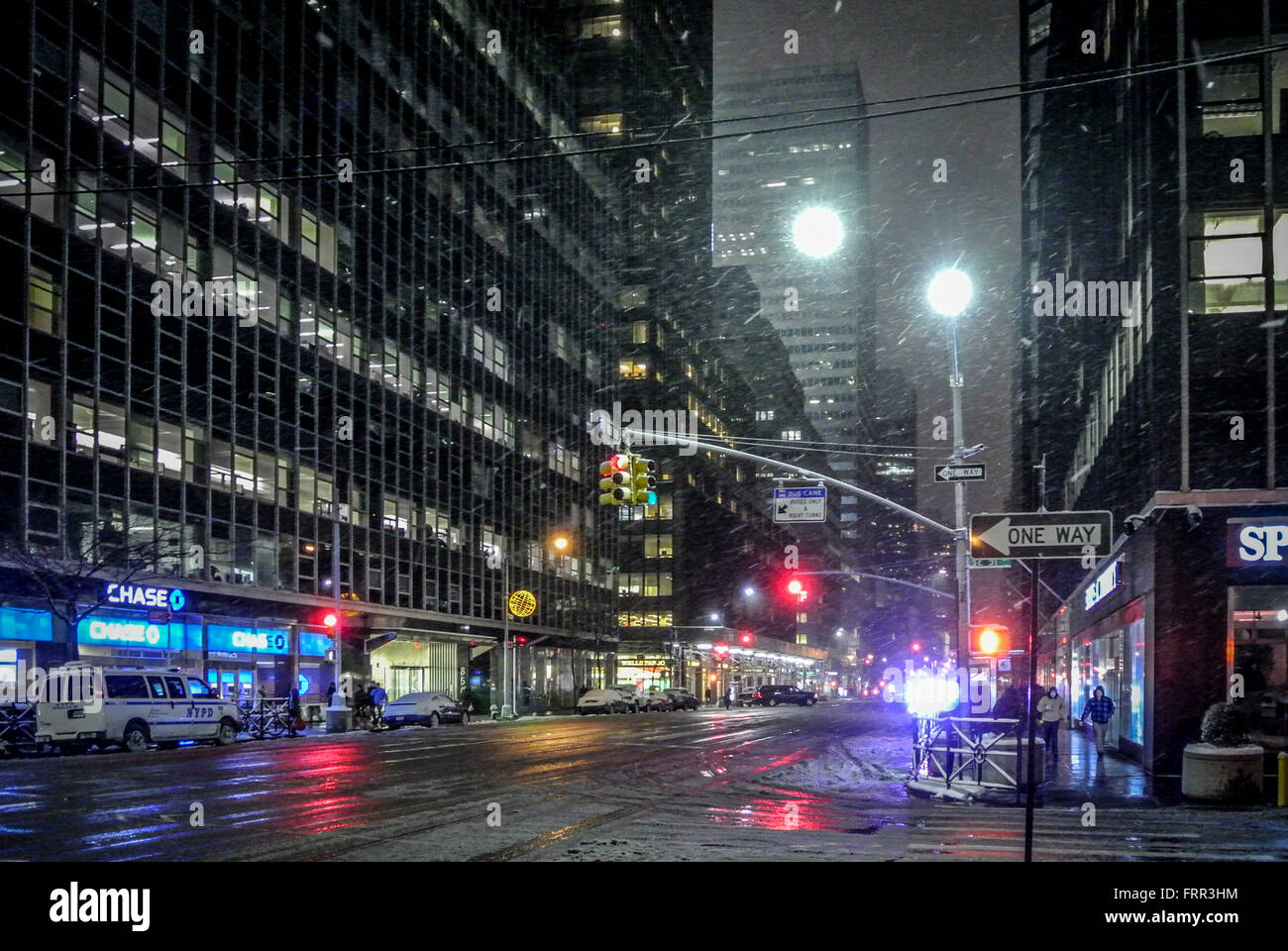 New York City street in winter with snow, USA. Stock Photo