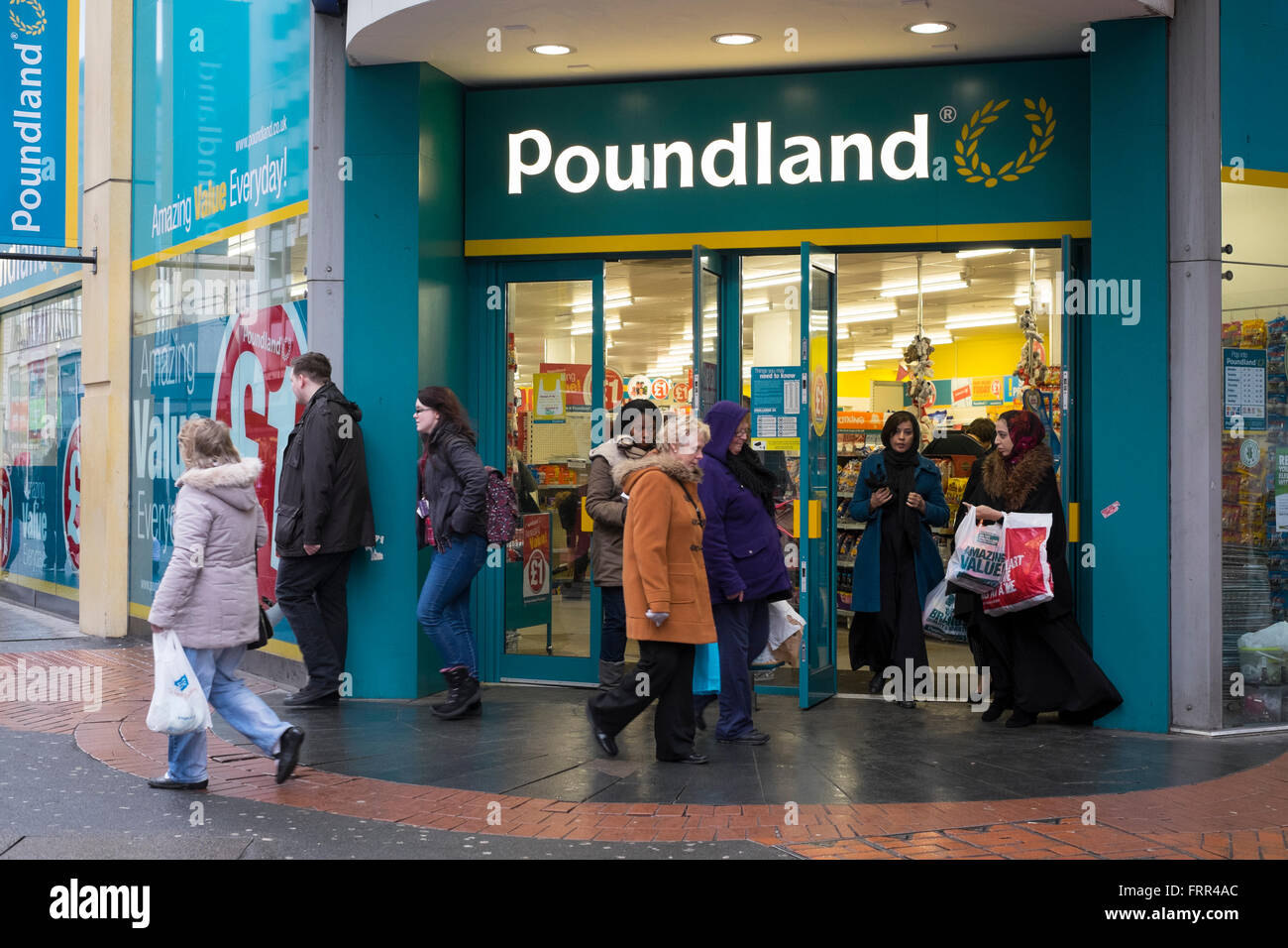Shoppers outside a Poundland store in Birmingham city centre, West Midlands, England, UK Stock Photo