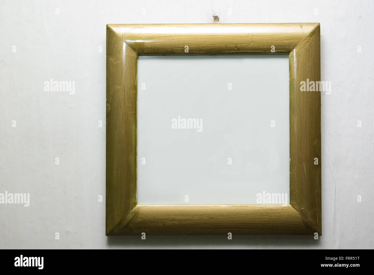 plain wooden picture frame on a wall Stock Photo Alamy