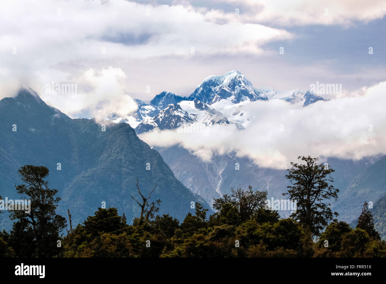 Mount Cook covered in clouds, Westland National Park,  South island,  New Zealand Stock Photo
