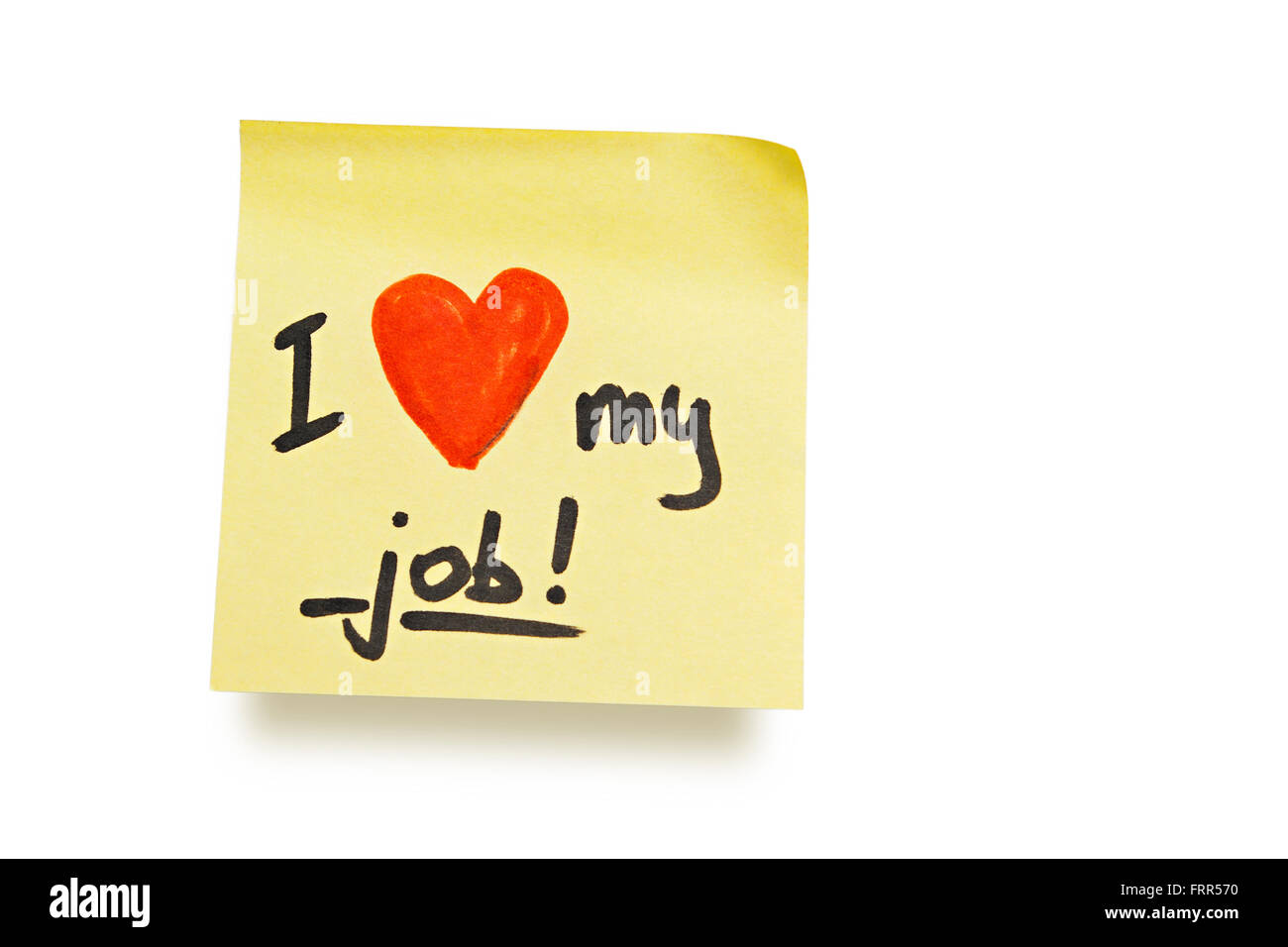 yellow adhesive note on white background with "i love my job" note ...