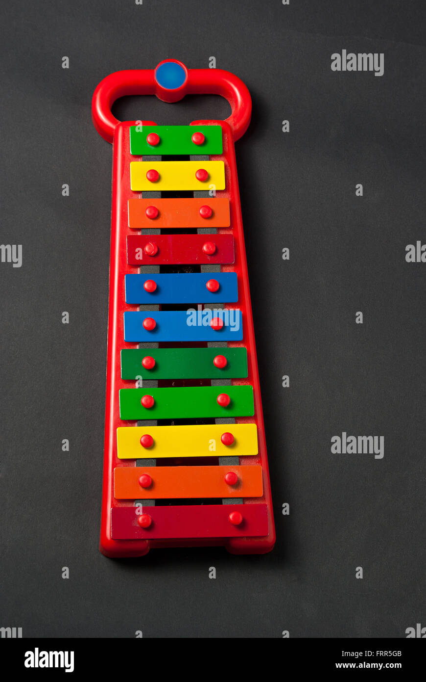 Xylophone metallophone for kids on dark grey background Stock Photo Alamy