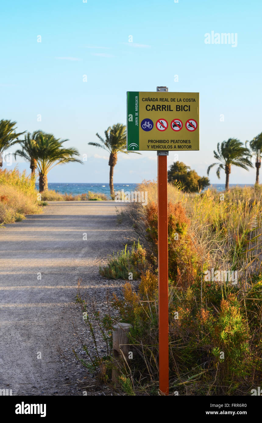 Sign for bicycle pathway/ carril bici along the beach at Roquetas de Mar, Almeria, Andalucia, Spain Stock Photo