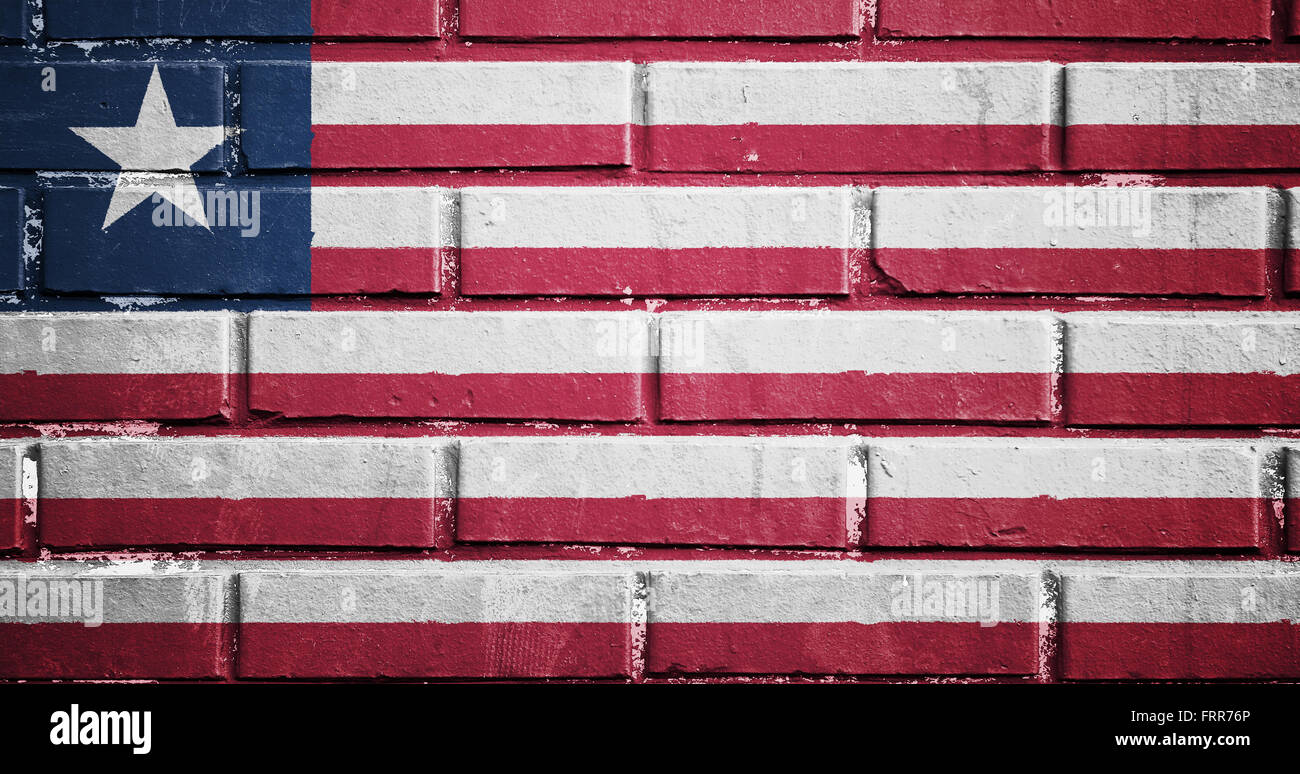 Liberia flag on texture brick wall Stock Photo - Alamy