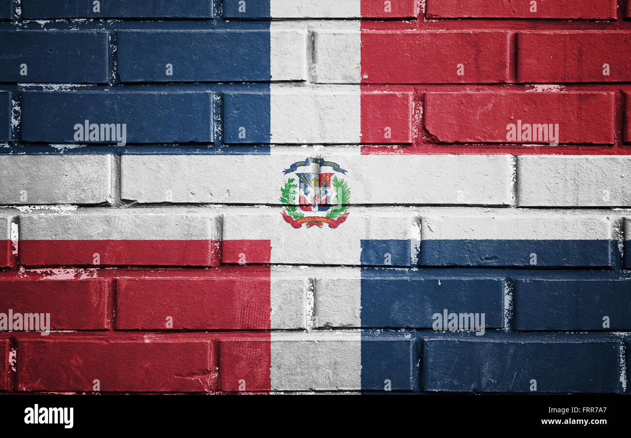 Dominican republic flag on texture brick wall Stock Photo - Alamy