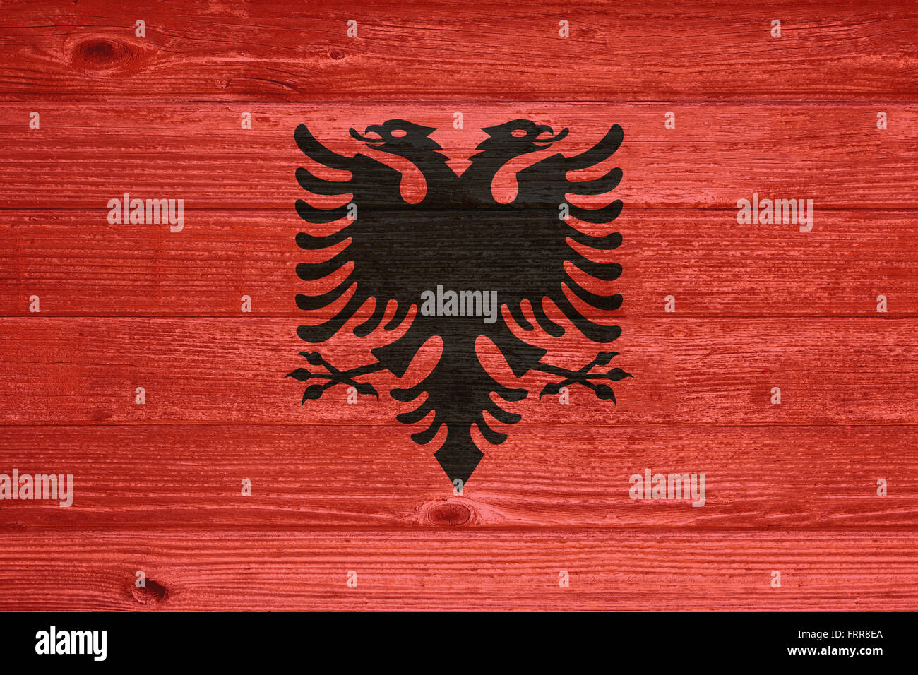 Albania Flag painted on old wood plank background Stock Photo - Alamy