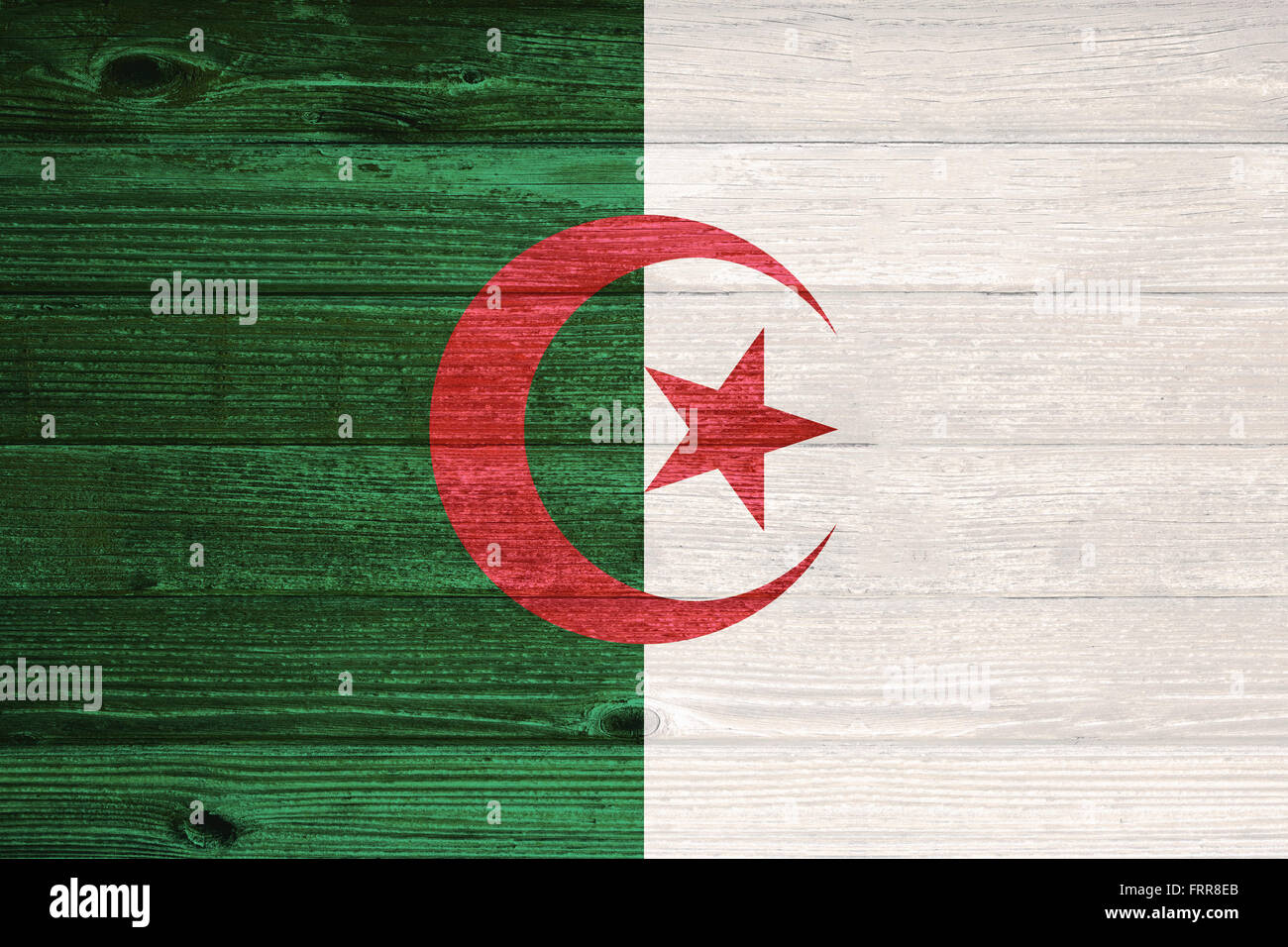 Algeria Flag painted on old wood plank background Stock Photo - Alamy