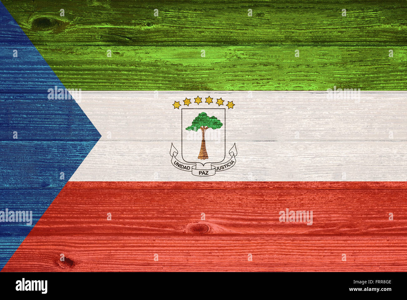 Equatorial Guinea Flag painted on old wood plank background Stock Photo