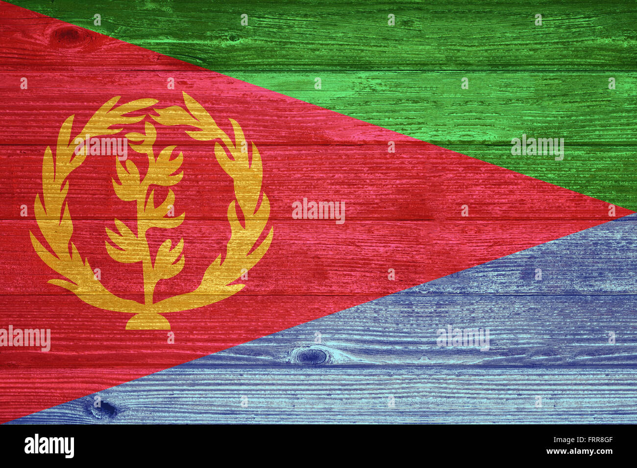 Eritrea Flag painted on old wood plank background Stock Photo - Alamy