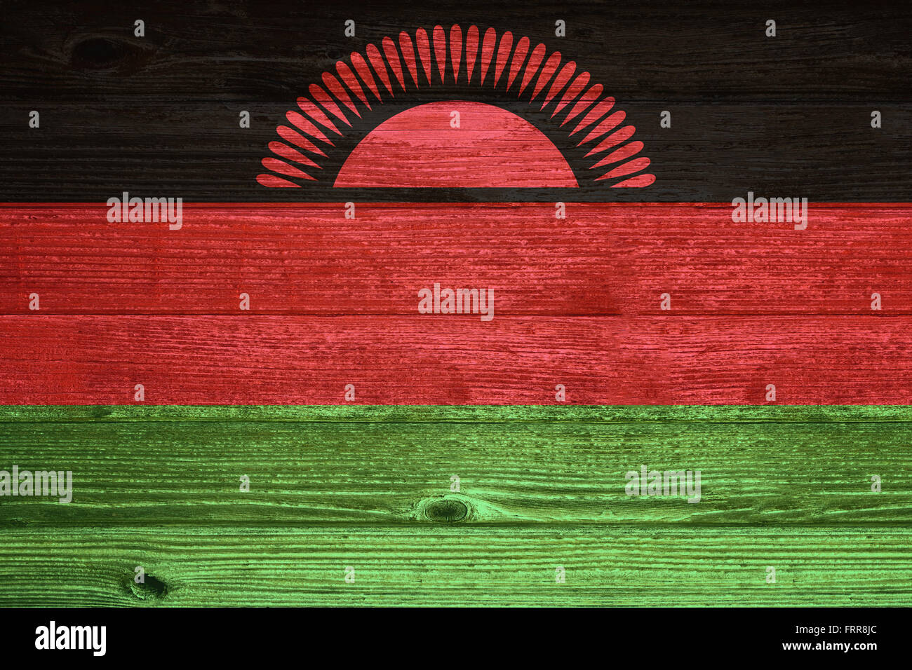 Malawi Flag painted on old wood plank background Stock Photo - Alamy