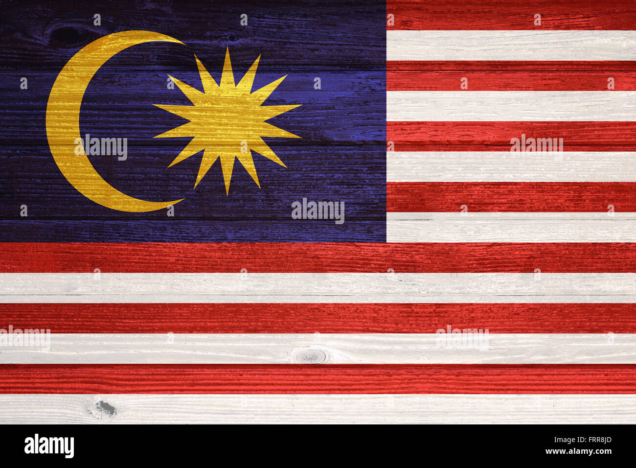 Malaysia Flag painted on old wood plank background Stock Photo - Alamy