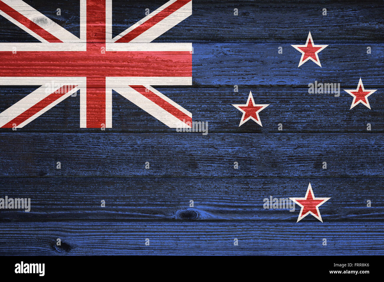 New Zealand Flag painted on old wood plank background Stock Photo - Alamy