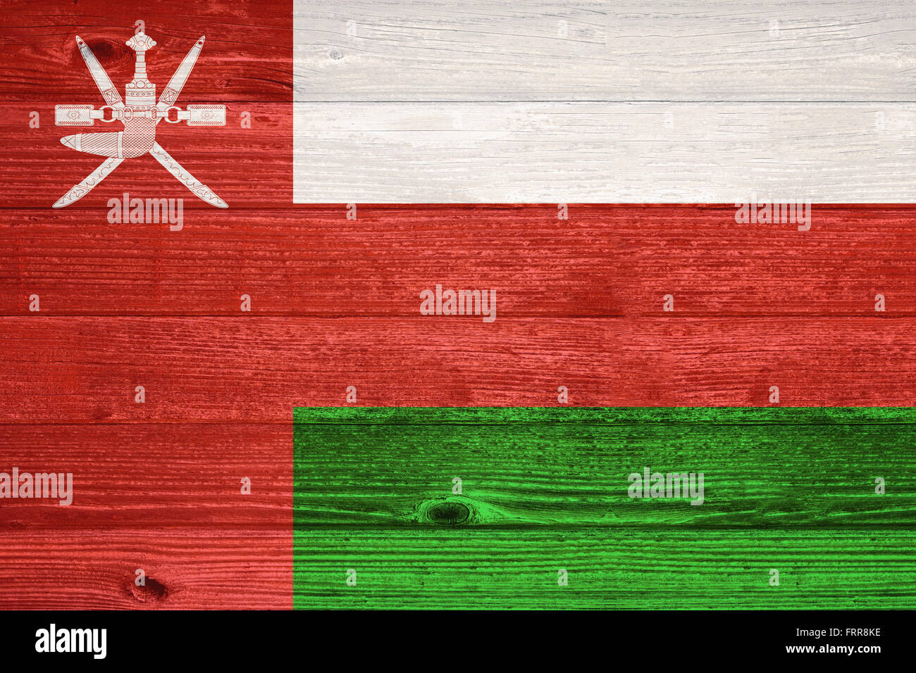 Oman Flag painted on old wood plank background Stock Photo - Alamy