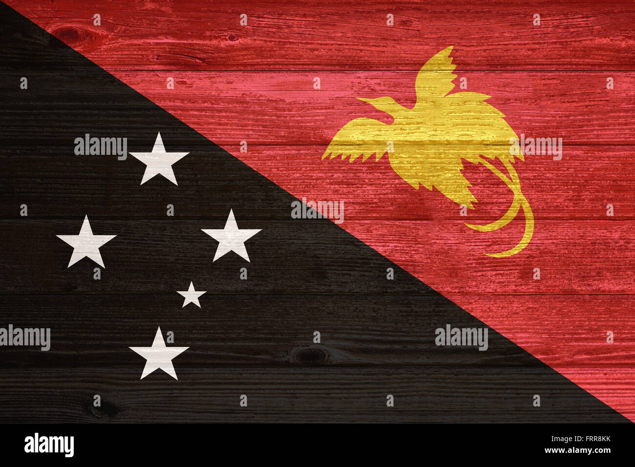 Papua New Guinea Flag painted on old wood plank background Stock Photo ...