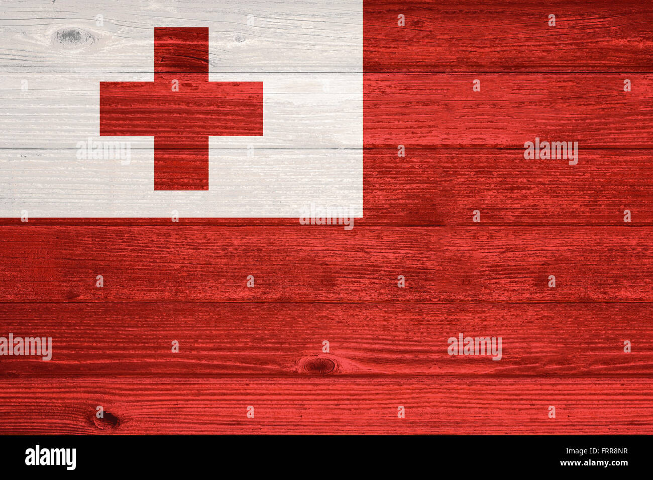 Tonga Flag painted on old wood plank background Stock Photo - Alamy