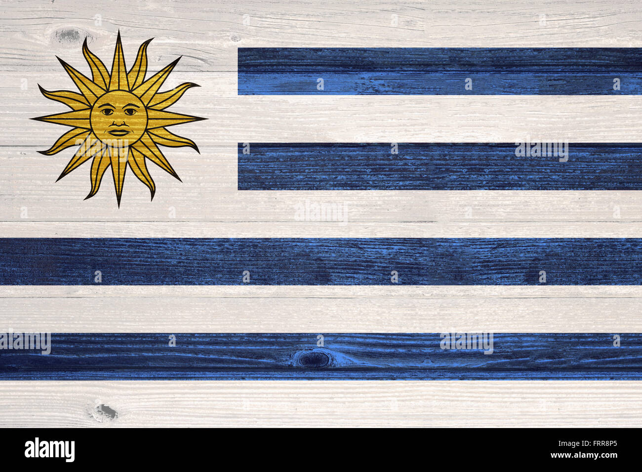 Uruguay Flag painted on old wood plank background Stock Photo - Alamy
