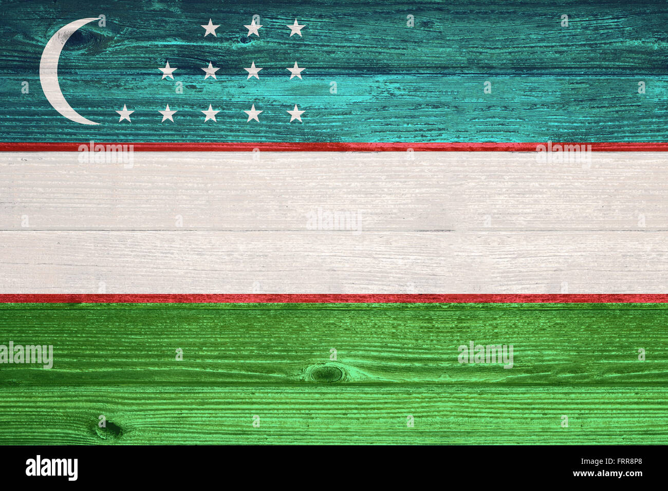 Uzbekistan Flag painted on old wood plank background Stock Photo - Alamy