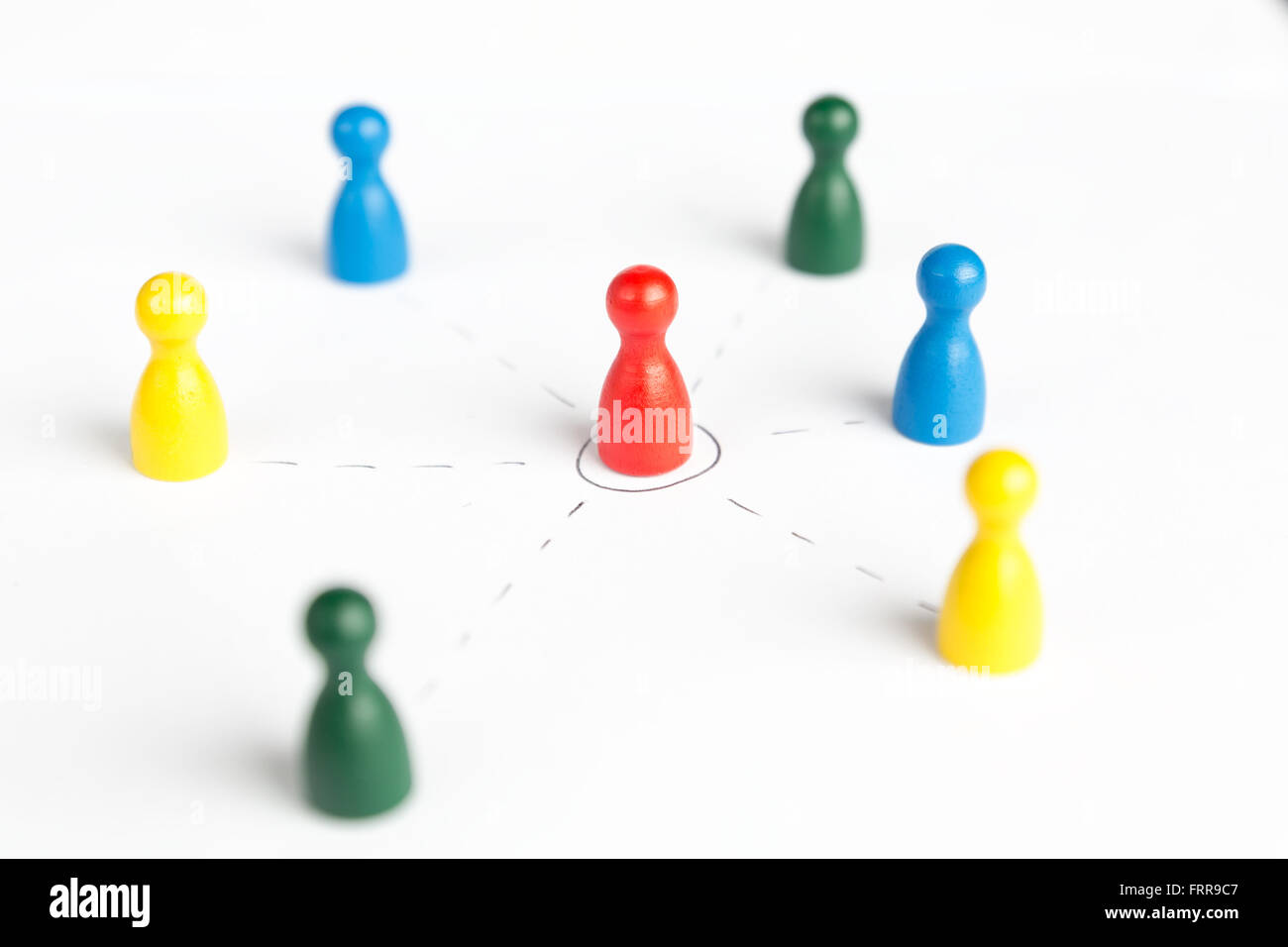 Game figurines outsource business diagram depicting community on white Stock Photo