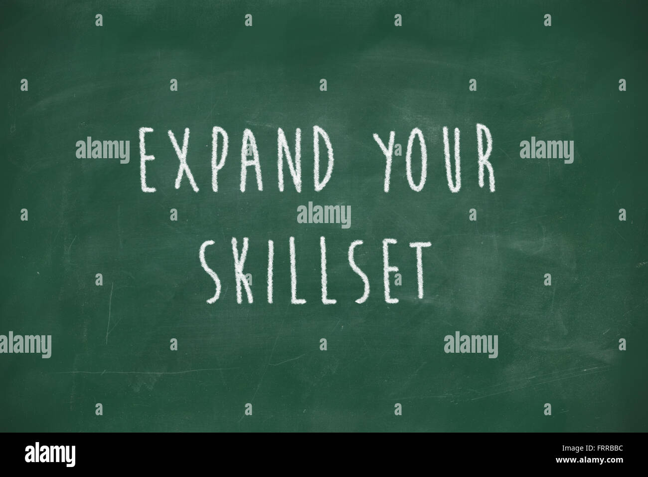 Expand your skillset handwritten on school blackboard Stock Photo Alamy