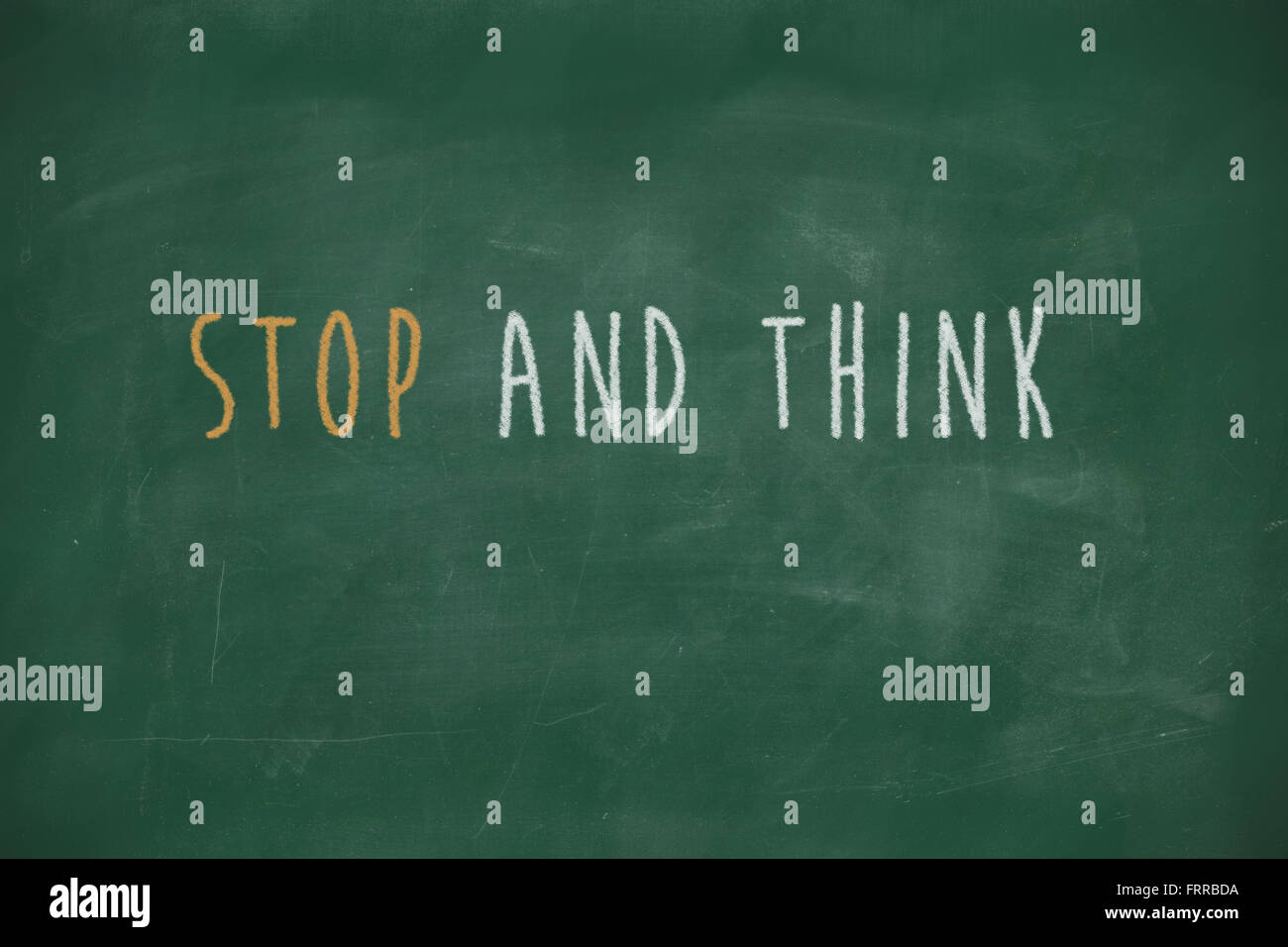 Stop And Think Handwritten On School Blackboard Stock Photo - Alamy