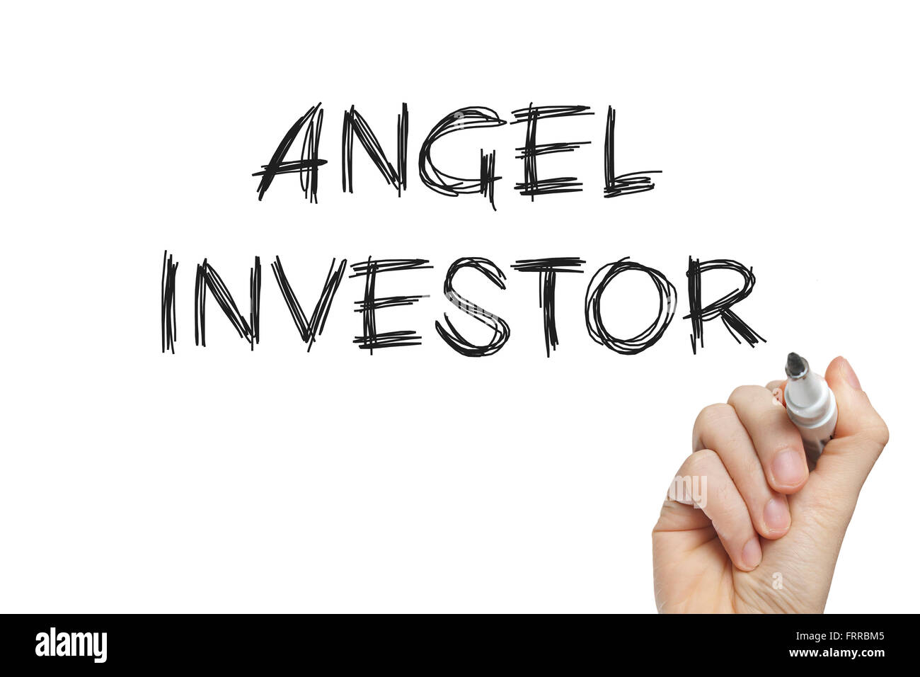 Hand writing angel investor on a white board Stock Photo